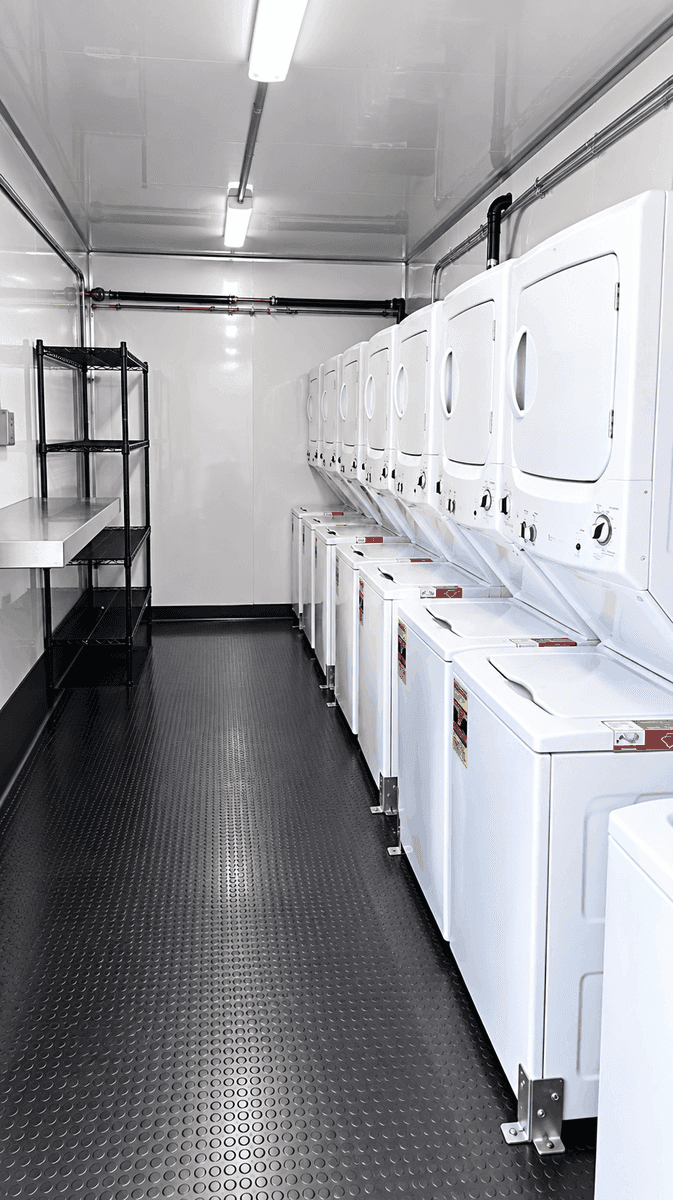 26–27 ft Laundry Trailer (8 Washer/Dryer) from the supplied equipment photo folder